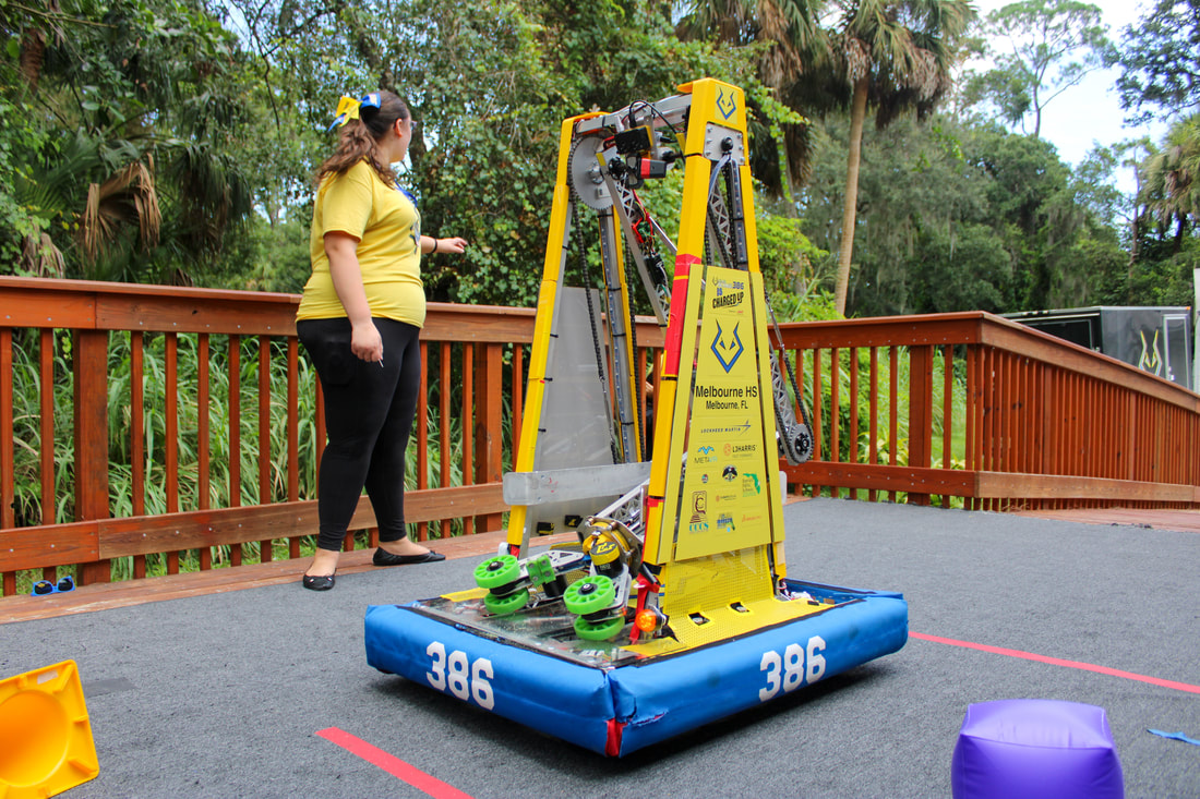 Camper learning soldering basics